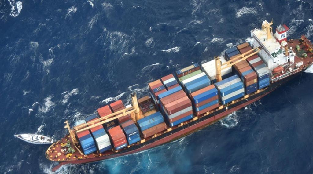 Platino is visible on the starboard bow of the Southern Lily as attempts are made to rescue the crew. - photo © New Zealand Defence Force